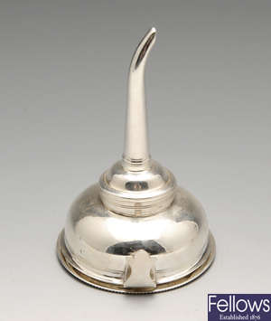 A George III silver wine funnel.