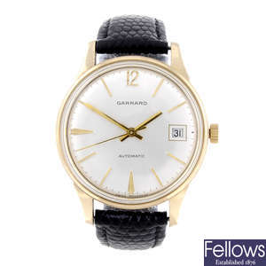 GARRARD - a gentleman's 9ct yellow gold wrist watch.