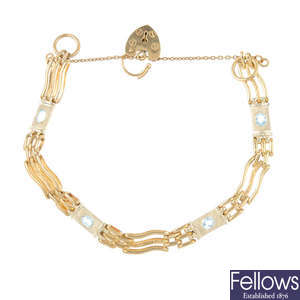 A 9ct gold topaz gate bracelet.