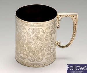 A late Victorian silver christening mug and a 1940's mug.