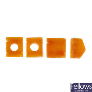 A selection of amber panels and beads.