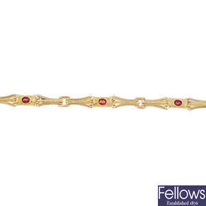 A 9ct gold garnet bracelet.