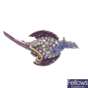 A late Victorian silver and gold, diamond, sapphire and ruby pheasant brooch.
