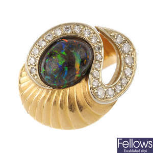 A boulder opal and diamond ring.