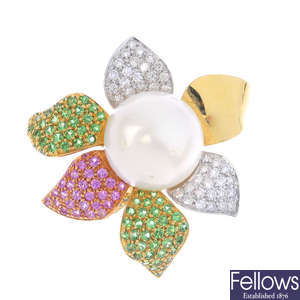 A cultured pearl and gem-set floral ring.
