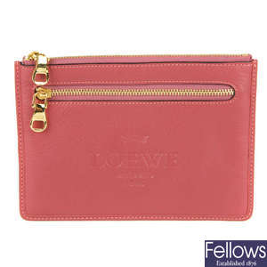 LOEWE - a pink purse.