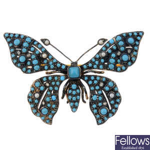 A turquoise and seed pearl butterfly brooch.