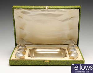 A cased set of six French tot cups & a matching small tray.