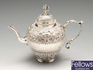 A 19th century Dutch silver bachelor teapot of pear form.