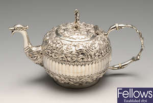 A 19th century Dutch silver bachelor teapot of compressed globular form.