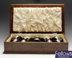 An early twentieth century matched silver condiment set in fitted oak case.