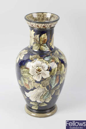 A Doulton Lambeth faience vase of baluster form.