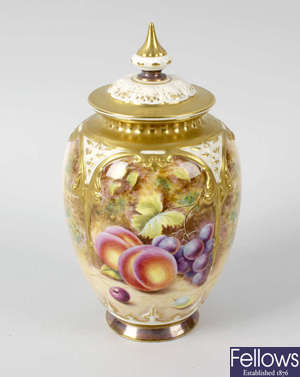 A Royal Worcester porcelain fruit-painted vase and cover by Henry