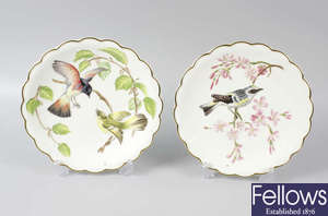 A set of twelve boxed Royal Worcester porcelain 'Birds of Dorothy Doughty' plates