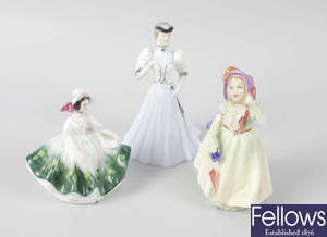 A group of fourteen small Royal Doulton figures