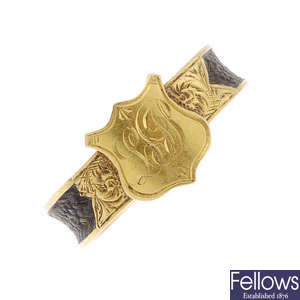An early 20th century 18ct gold and hair memorial monogram ring.