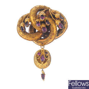 A mid Victorian gold garnet brooch.