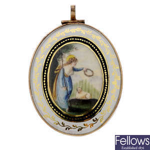 A mid to late Victorian hand painted and enamel hinged pendant.