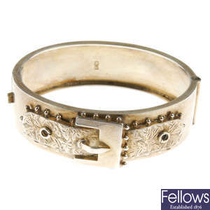 A late Victorian silver buckle bangle.
