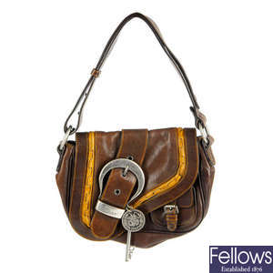 CHRISTIAN DIOR - a small Gaucho saddle handbag.