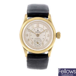 ROLEX - a gold plated wrist watch.