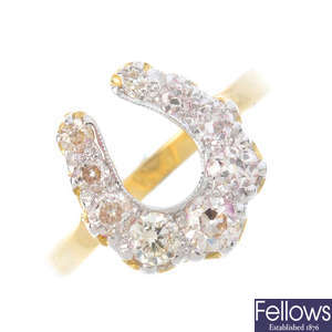 A diamond horseshoe ring.