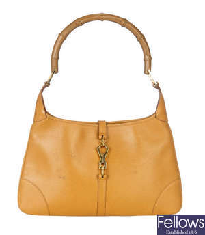 GUCCI - a tan leather handbag.