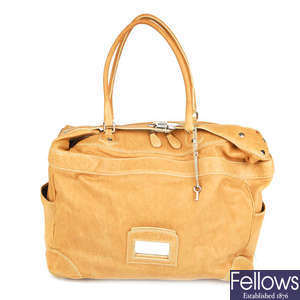 BALENCIAGA - a leather handbag.