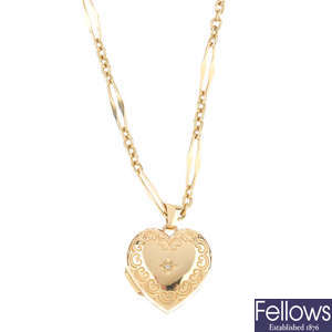 A 9ct gold diamond heart locket, with chain.