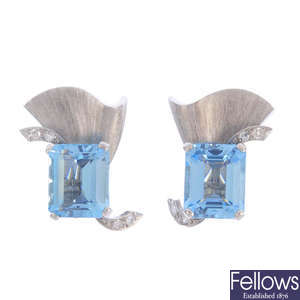 A pair of aquamarine earrings.