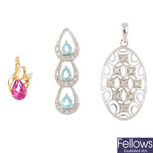 Three gem-set and diamond pendants.