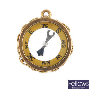 A 1920s 9ct gold compass fob.