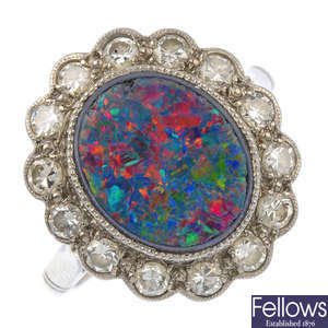 A mid 20th century 18ct and platinum, opal doublet and diamond cluster ring.