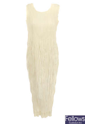ISSEY MIYAKE - a cream pleated dress.