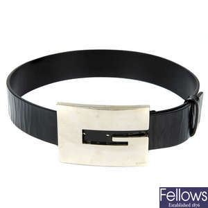GUCCI - a belt with oversized buckle.