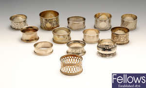A selection of assorted silver napkin rings.