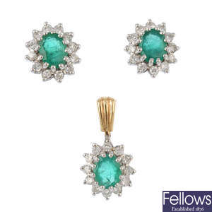 A set of emerald and diamond jewellery.