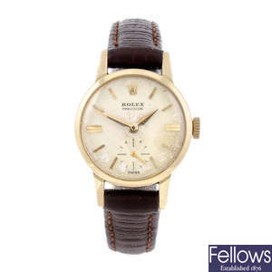 ROLEX - a lady's yellow metal Precision wrist watch.