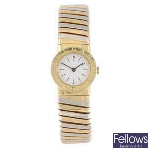 BULGARI - a lady's 18ct yellow gold Tubogas bracelet watch.