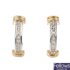 A pair of 9ct gold diamond half-hoop earrings. 