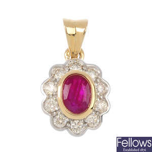 A 9ct gold ruby and diamond cluster pendant.