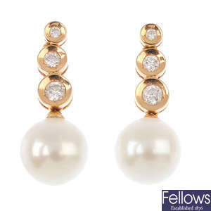 A set of cultured pearl and diamond jewellery.