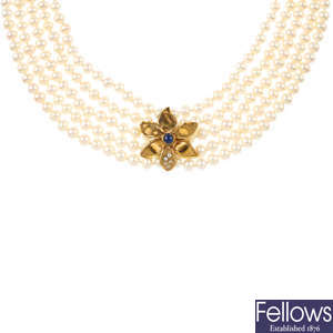 A cultured pearl five-row necklace, with a 9ct gold sapphire clasp.