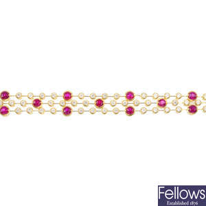 An 18ct gold ruby and diamond bracelet.