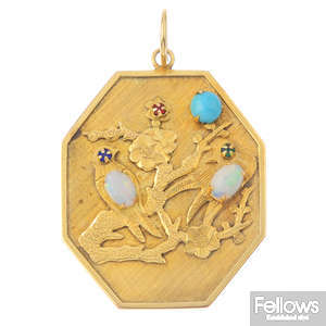 An opal and gem-set pendant.