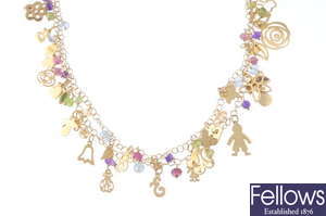 An enamel and gem-set charm necklace.