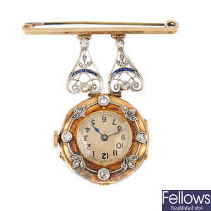 A gold, diamond and sapphire fob watch.