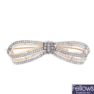 A pearl and diamond bow brooch.