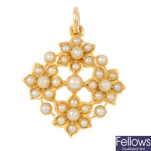 An early 20th century gold split and seed pearl pendant.