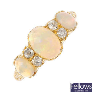 An Edwardian 18ct gold opal and diamond ring.